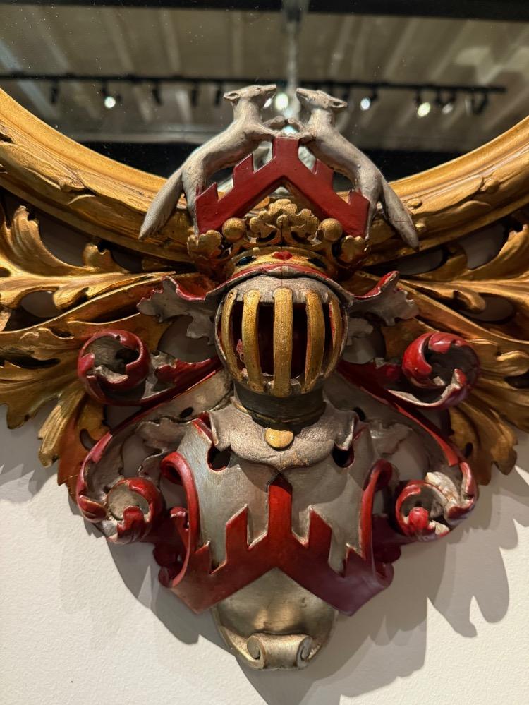 A 19th Century Baroque Revival oval mirror. 