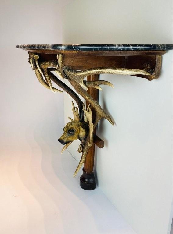 A Black Forest antlers console. 