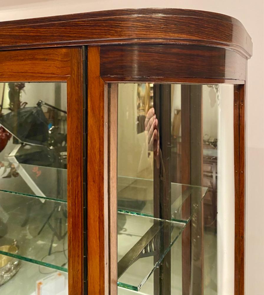A bow ended display cabinet. 