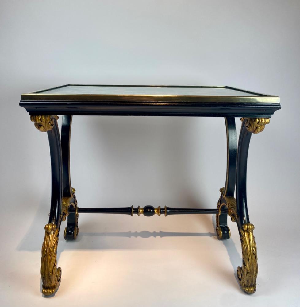 A fine Italian early 19th century ebonized mahogany and polychrome table with Pietra Dura and Specimen marble top   