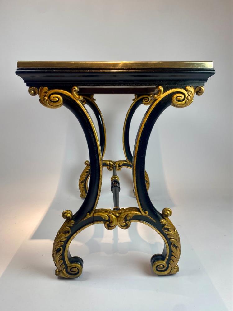 A fine Italian early 19th century ebonized mahogany and polychrome table with Pietra Dura and Specimen marble top   