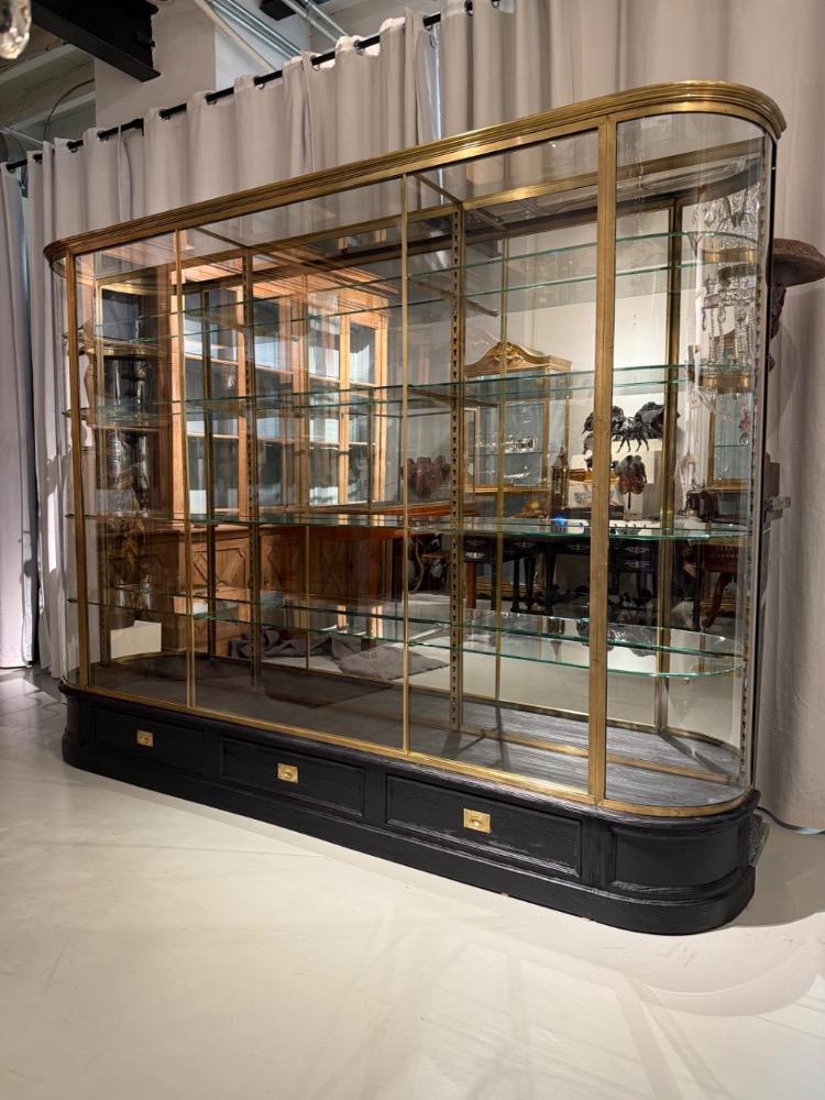 A large brass display cabinet