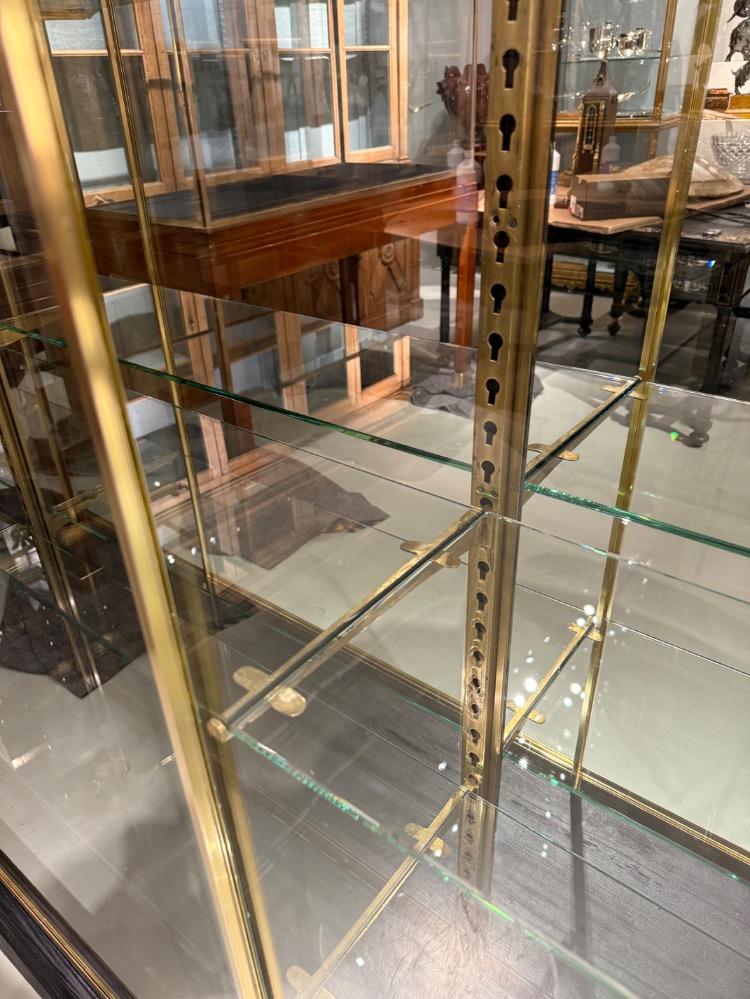 A large brass display cabinet