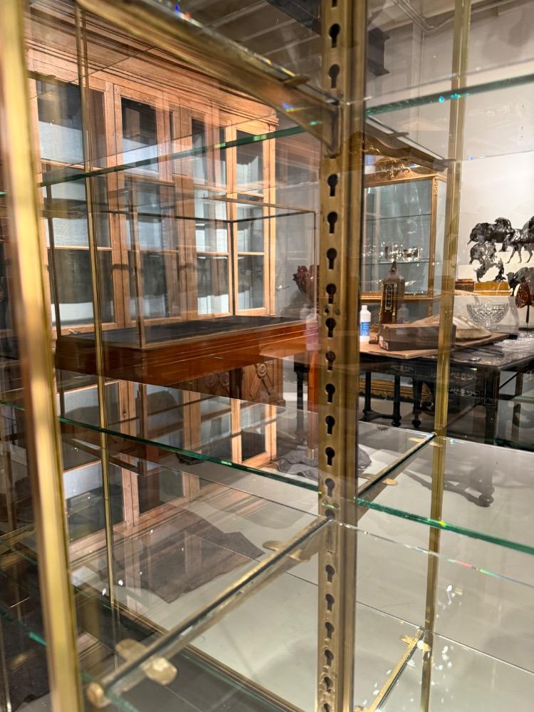 A large brass display cabinet