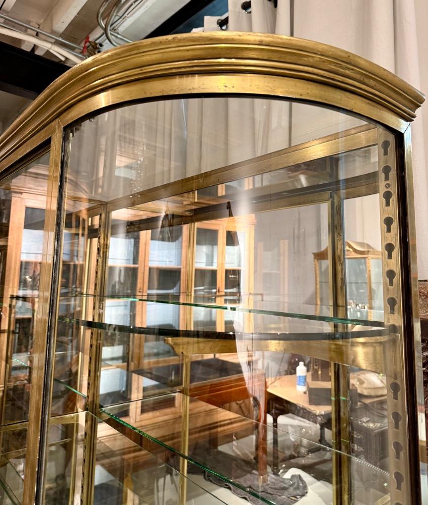 A large brass display cabinet