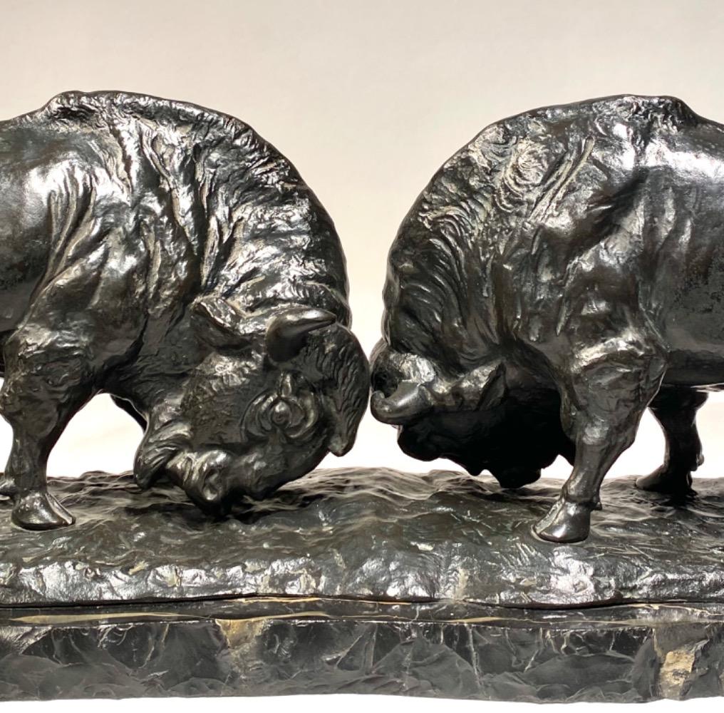 A LARGE BRONZE GROUP OF TWO BISON EARLY 20TH CENTURY, by FRANZ IFFLAND (1862-1935)