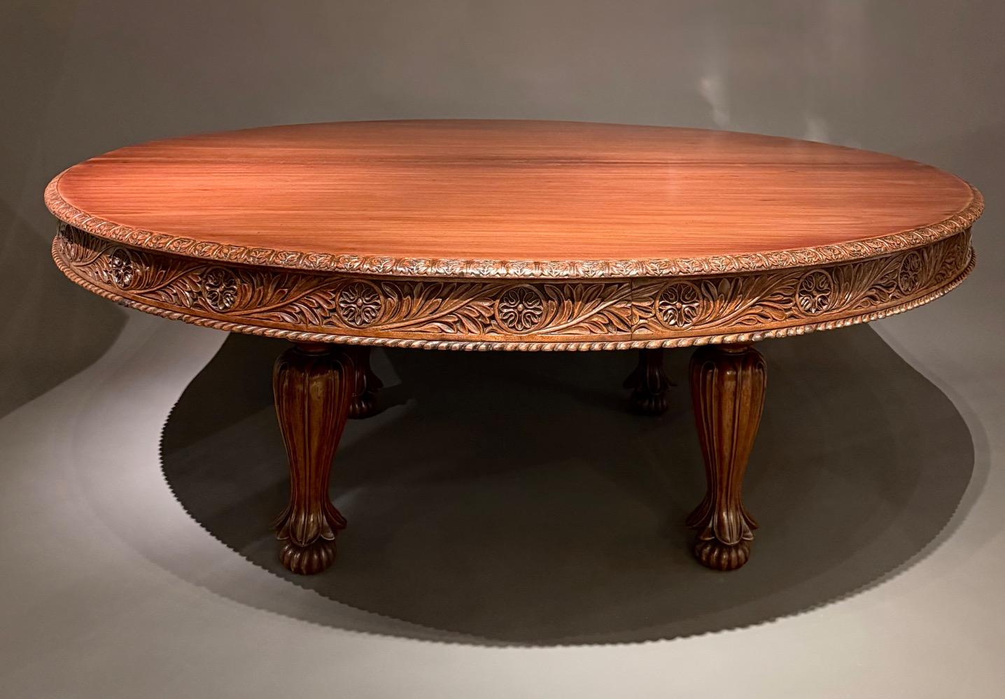 A large round dining table. 12 persons. 