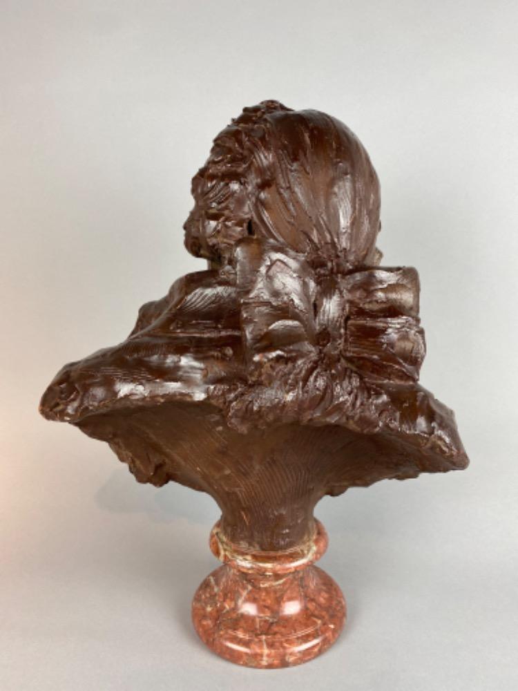 A late 18thC. terracotta bust of a gentleman. 