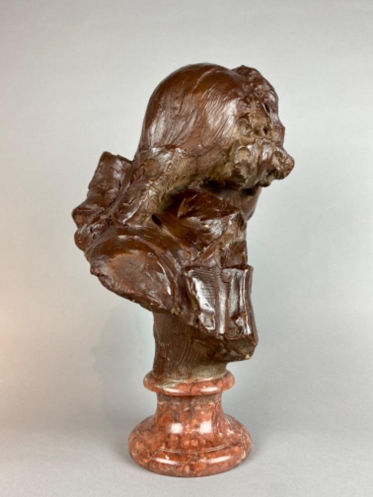 A late 18thC. terracotta bust of a gentleman. 