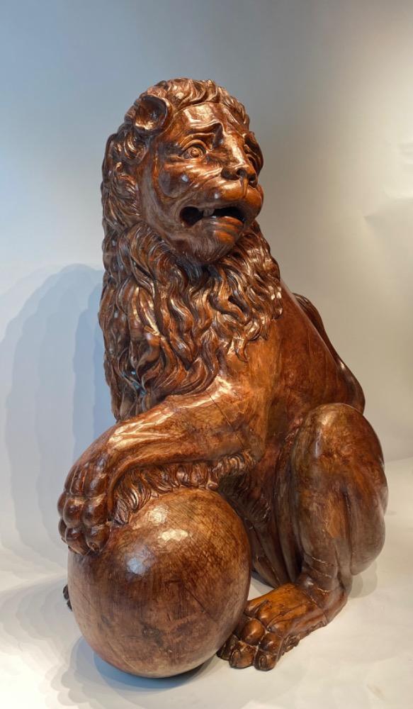 A life size carved lime wood Medici lion. 