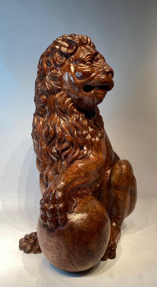 A life size carved lime wood Medici lion. 