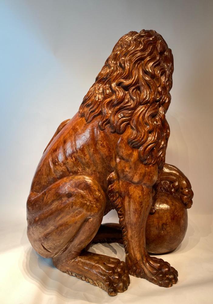 A life size carved lime wood Medici lion. 