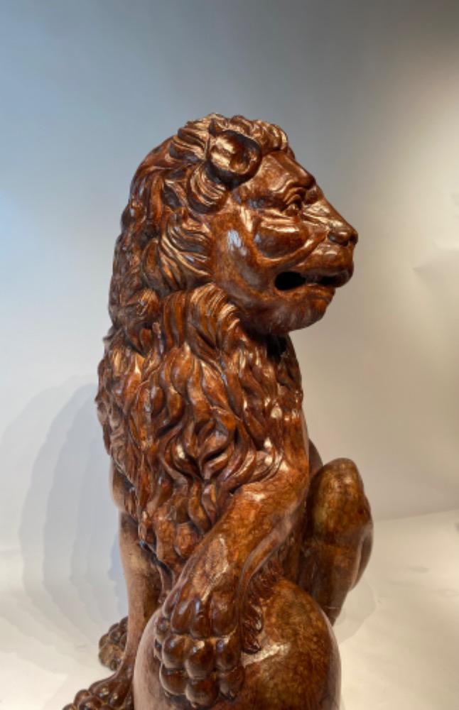 A life size carved lime wood Medici lion. 