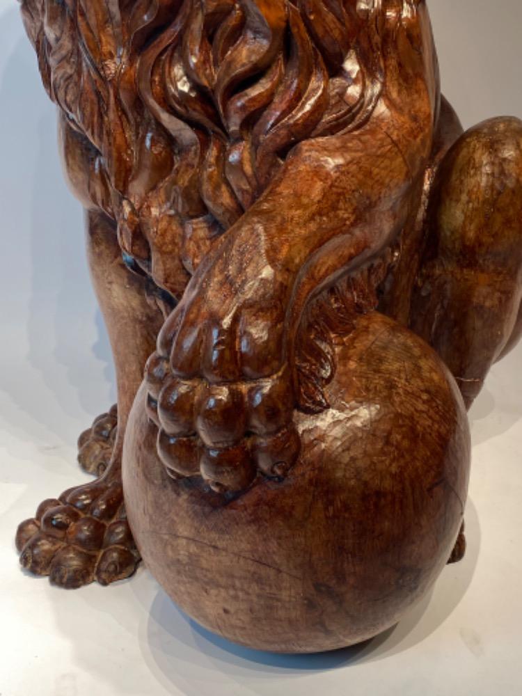 A life size carved lime wood Medici lion. 