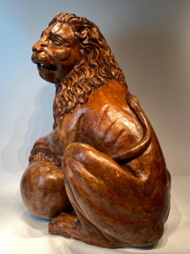 A life size carved lime wood Medici lion. 