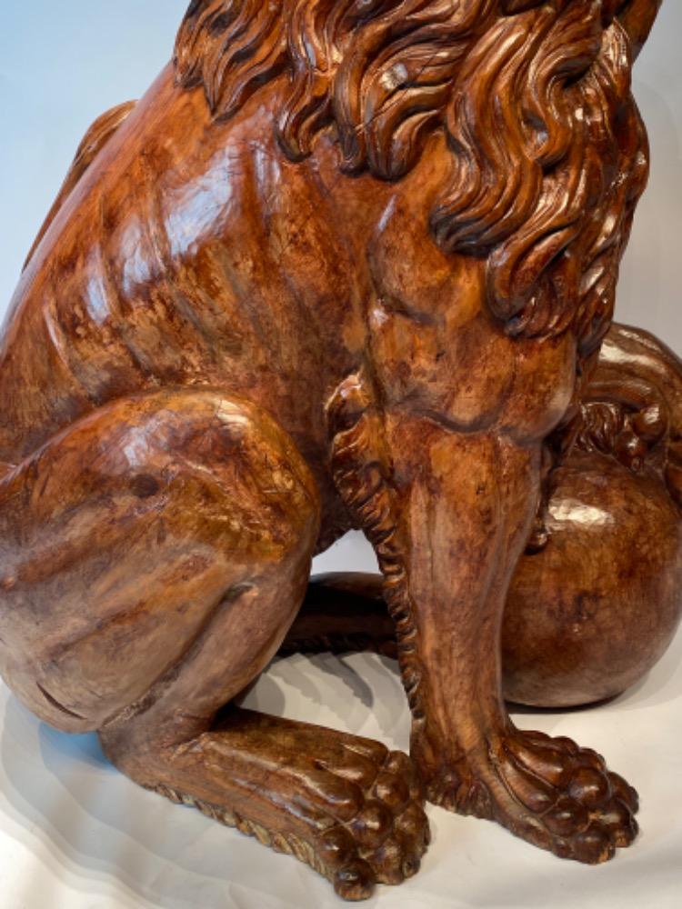 A life size carved lime wood Medici lion. 