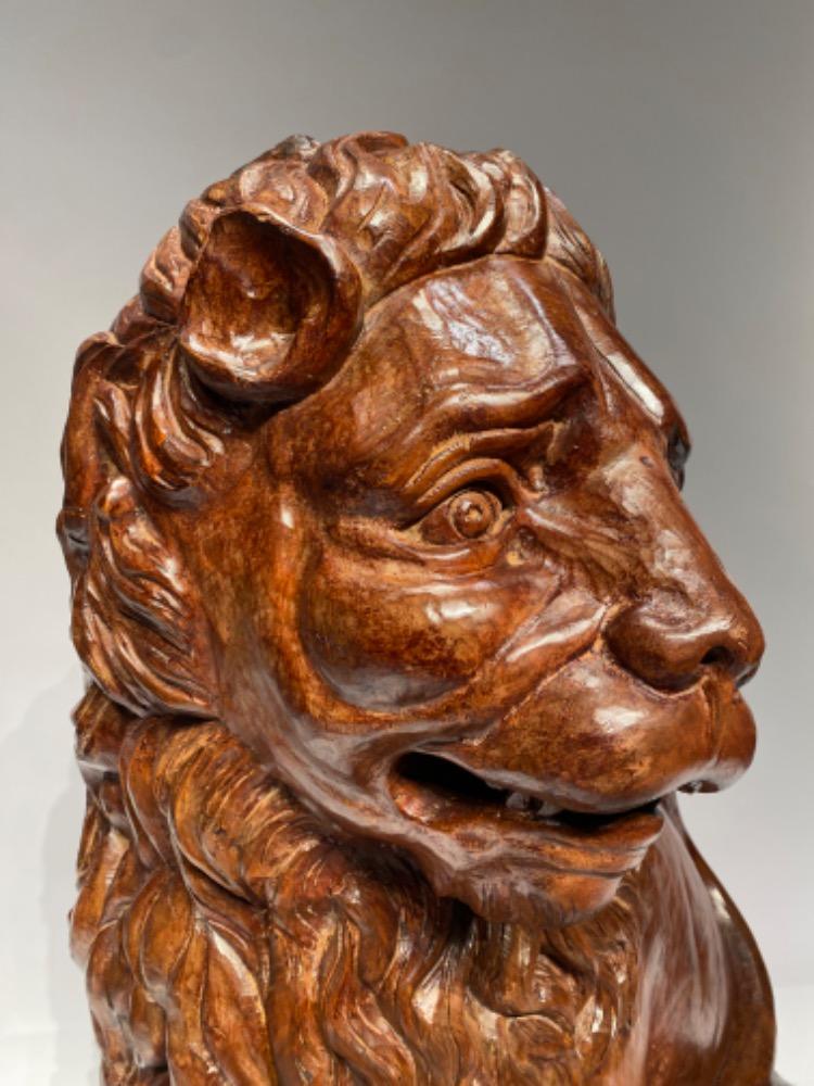 A life size carved lime wood Medici lion. 