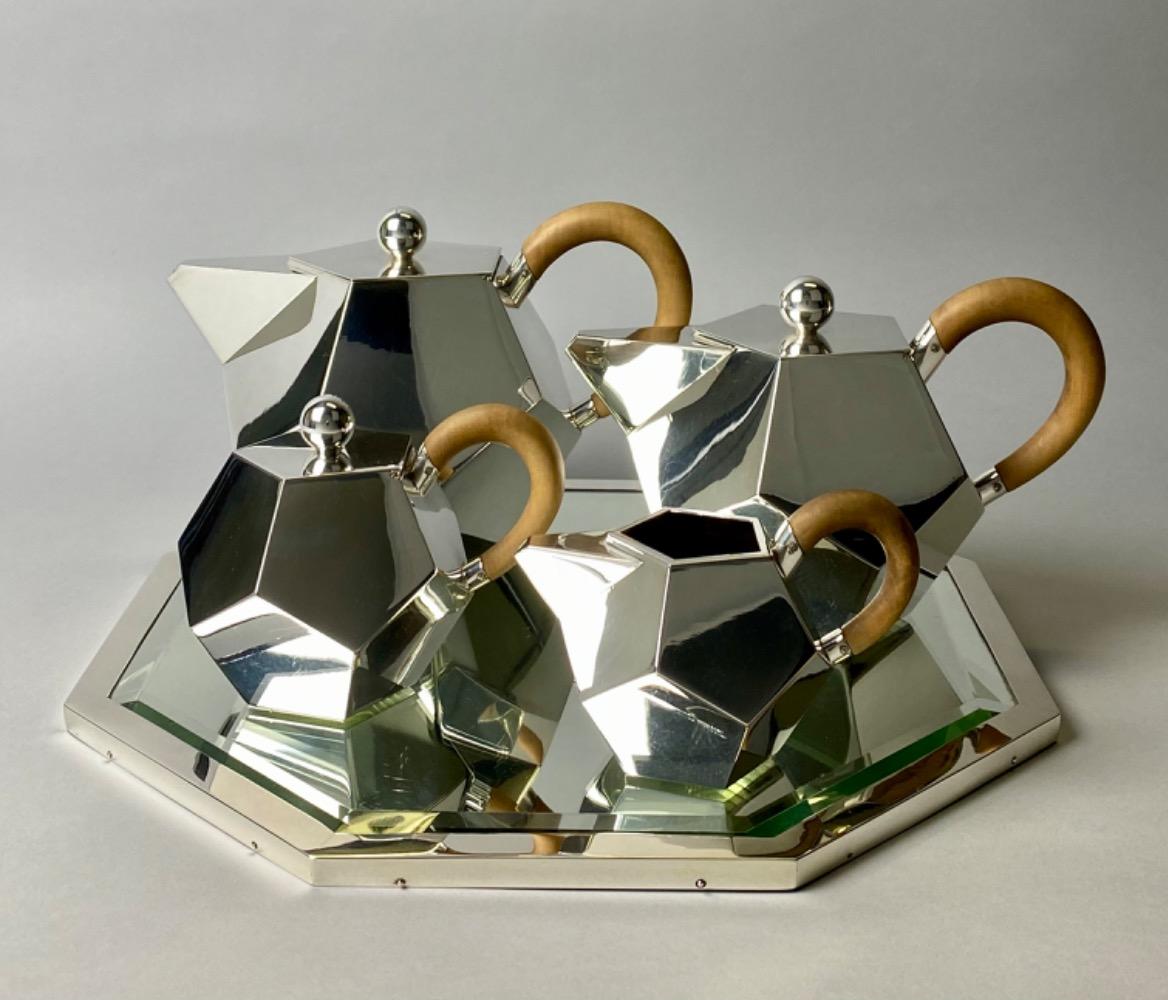 A rare modernist pentagonal silver coffee and tea service. 