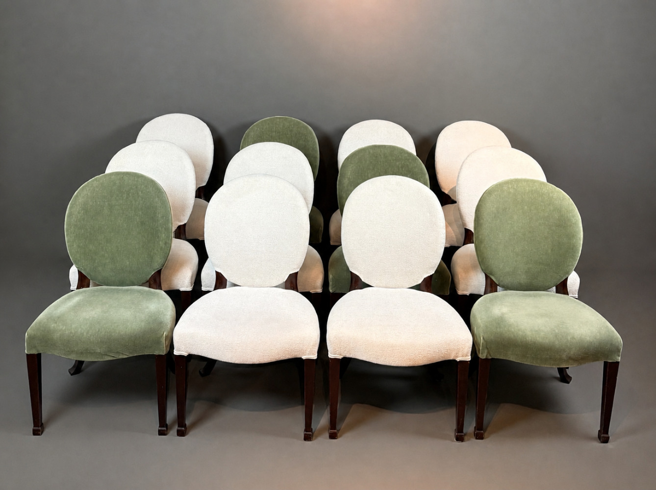 A set of 12 Regency Revival dining chairs. 
