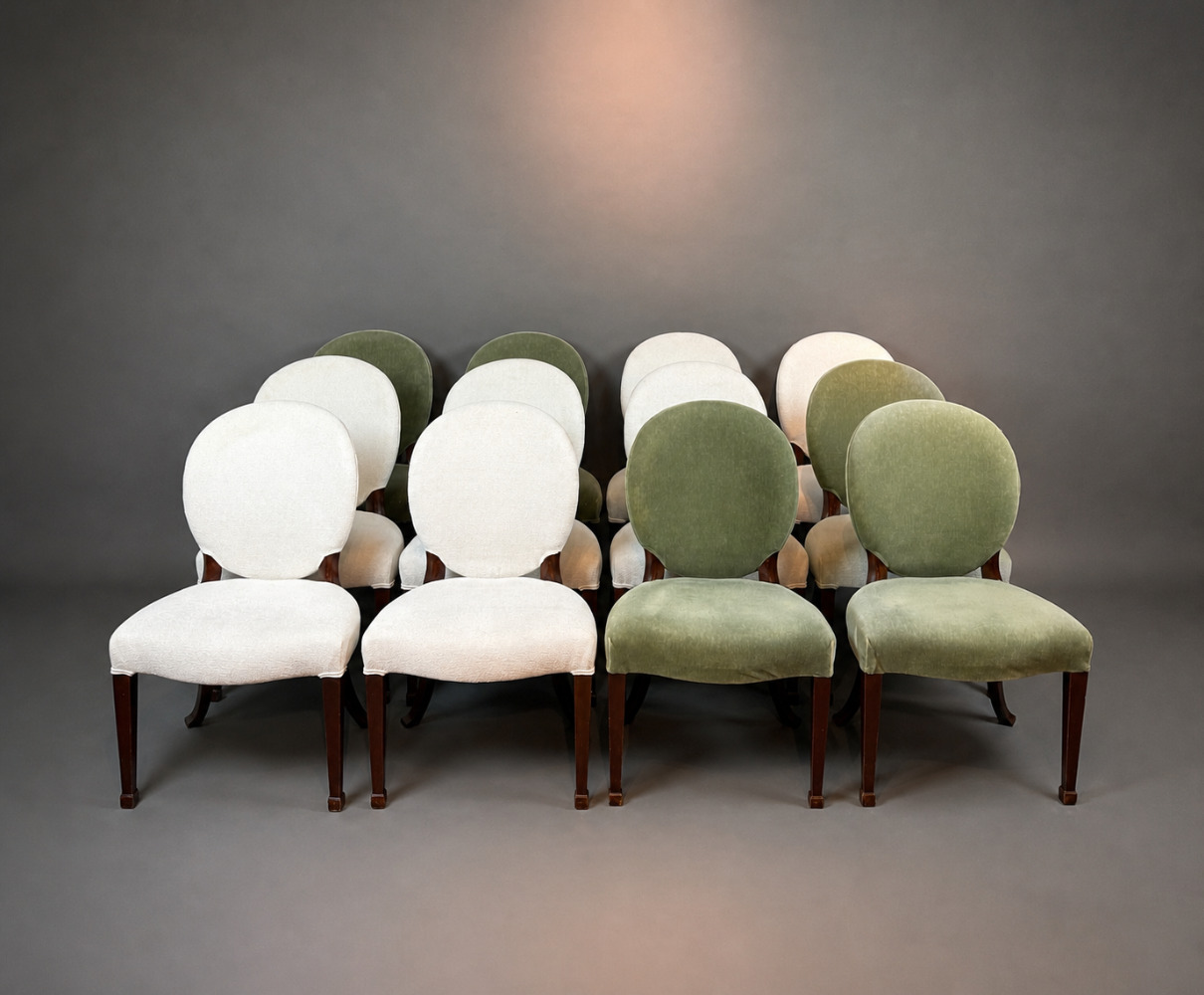 A set of 12 Regency Revival dining chairs. 