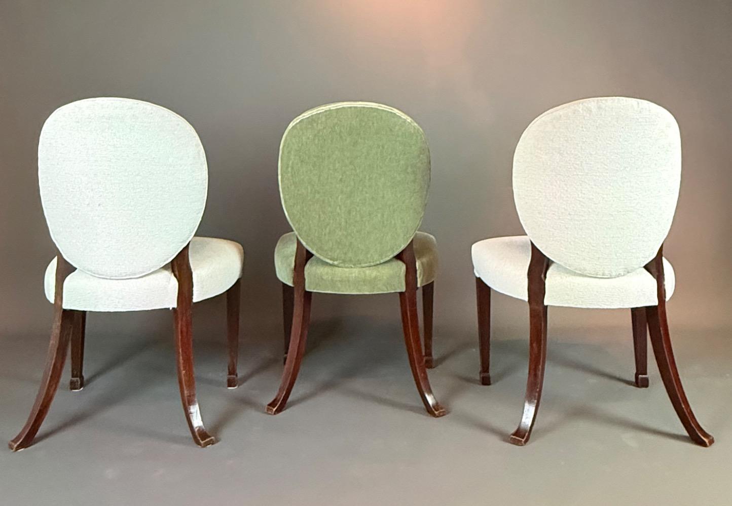 A set of 12 Regency Revival dining chairs. 