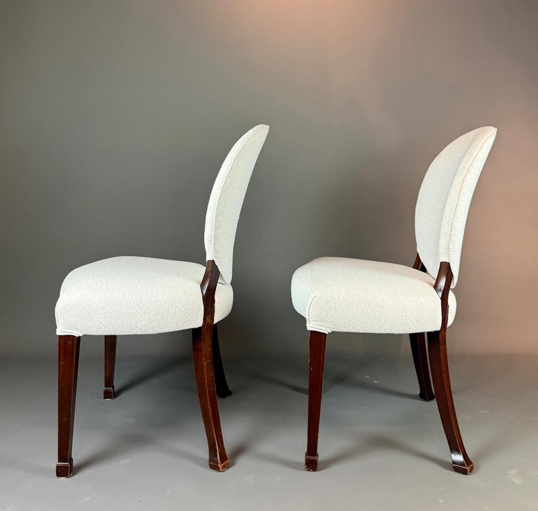 A set of 12 Regency Revival dining chairs. 