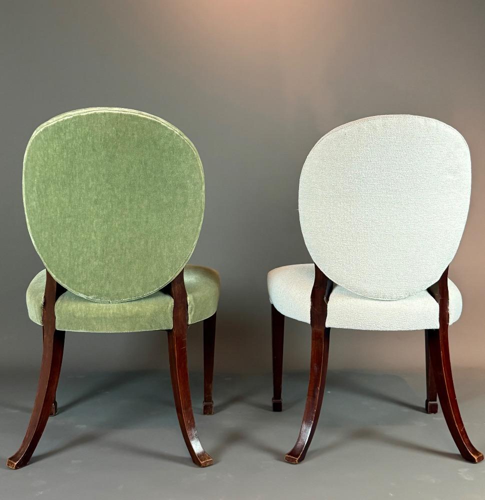 A set of 12 Regency Revival dining chairs. 
