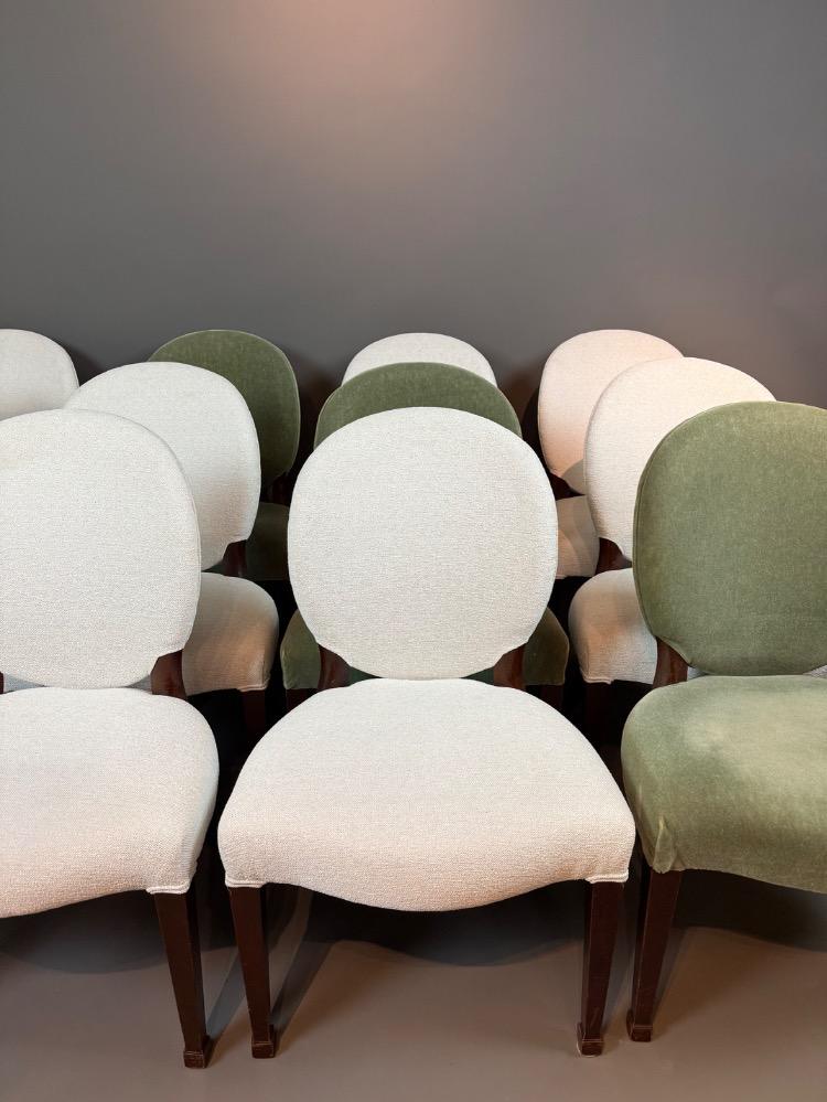 A set of 12 Regency Revival dining chairs. 