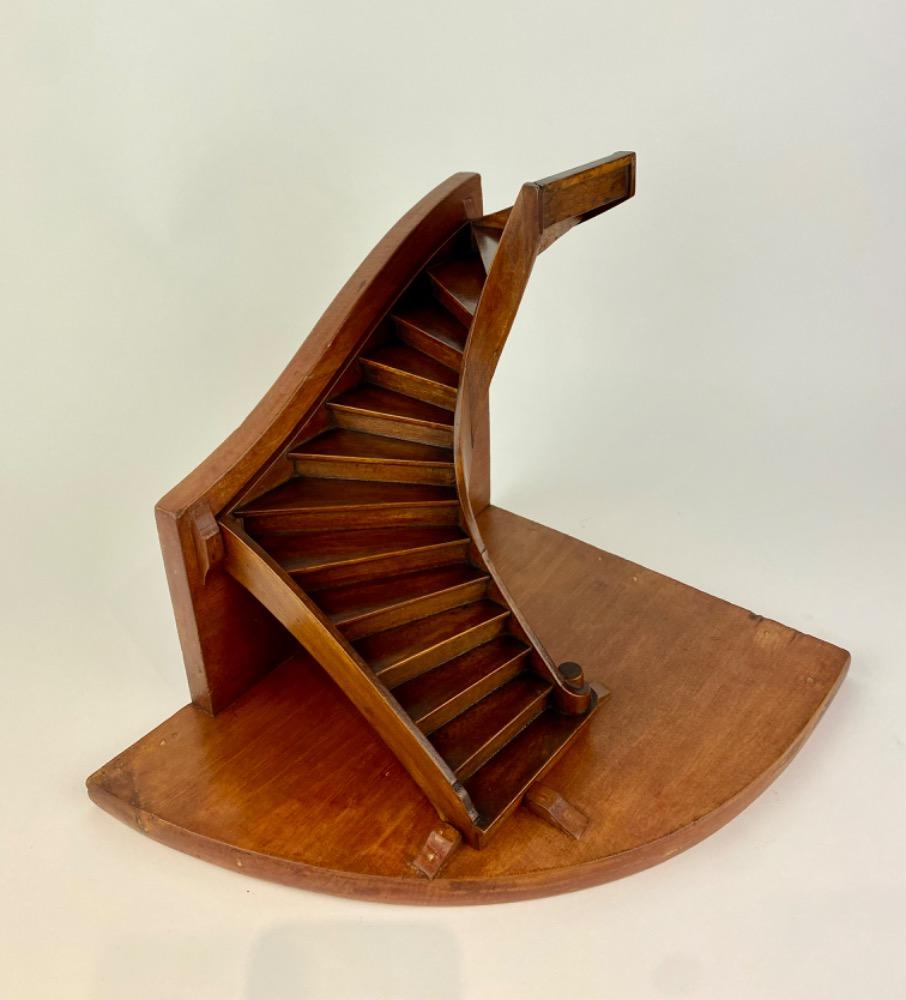 A stained beech wood staircase of mastery or 