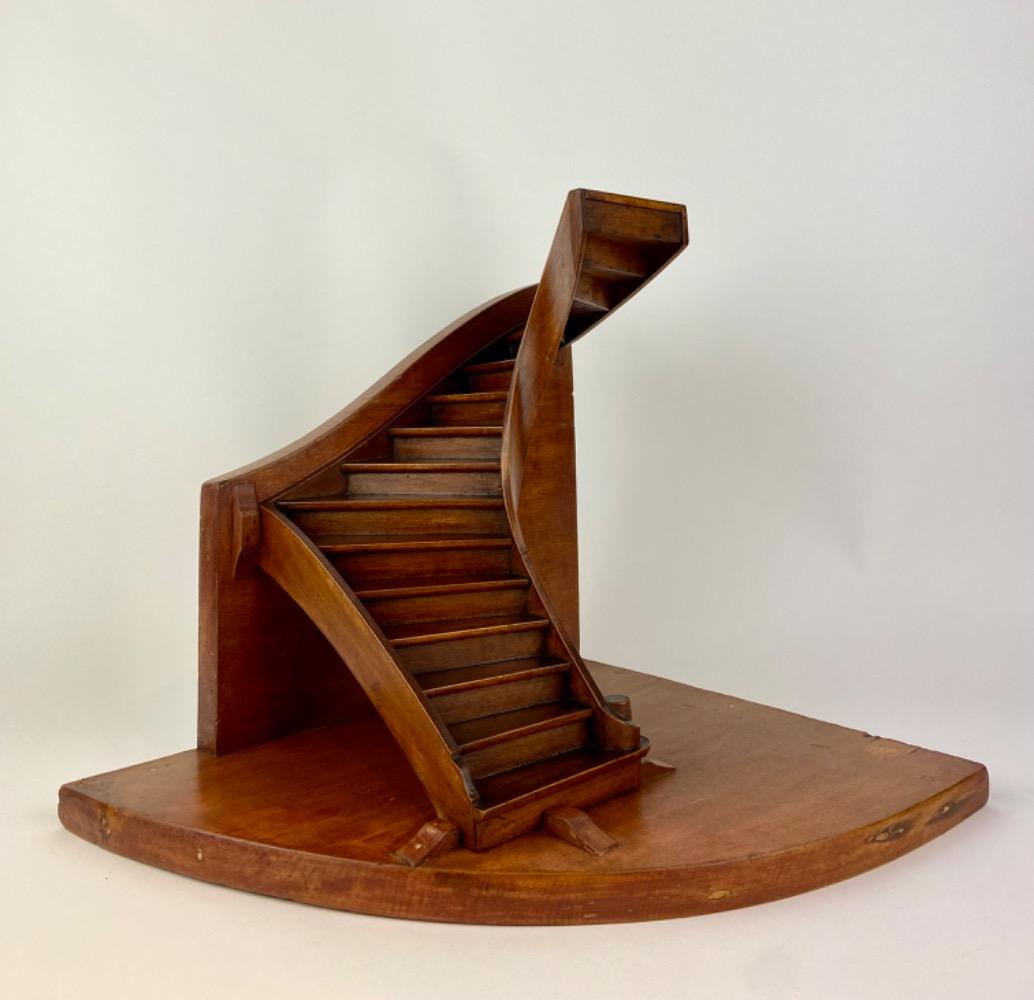 A stained beech wood staircase of mastery or 