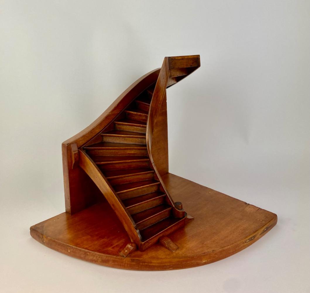 A stained beech wood staircase of mastery or 