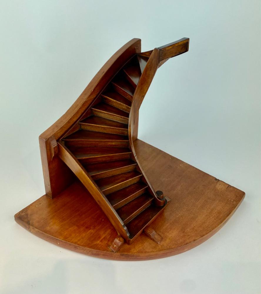 A stained beech wood staircase of mastery or 