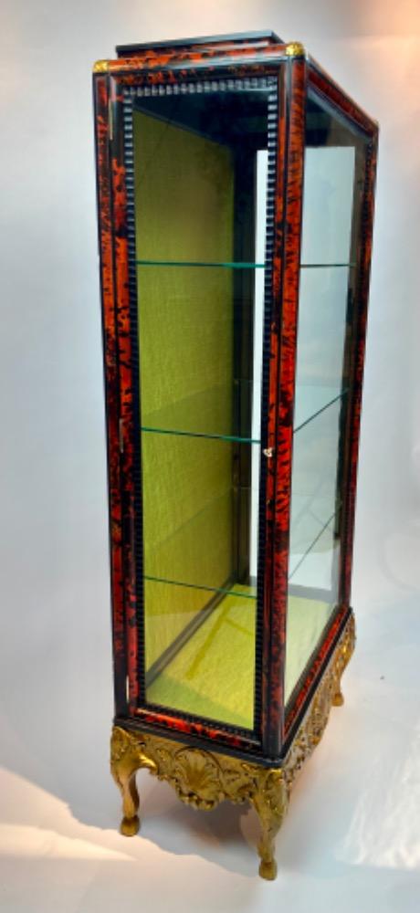 A tortoise shell vitrine by Maison Franck. 