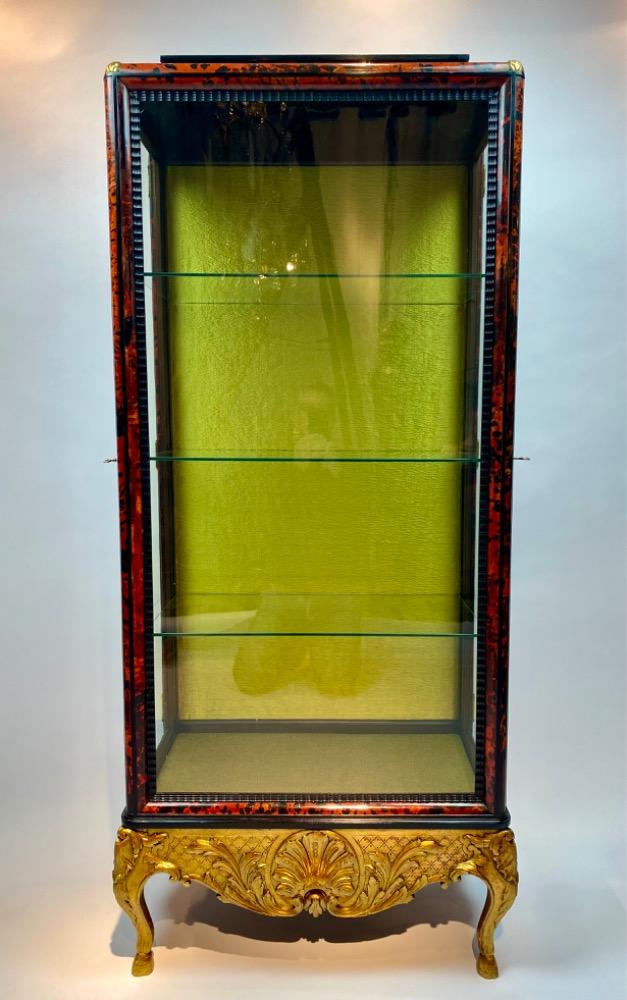 A tortoise shell vitrine by Maison Franck. 