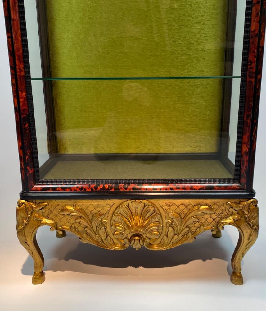 A tortoise shell vitrine by Maison Franck. 