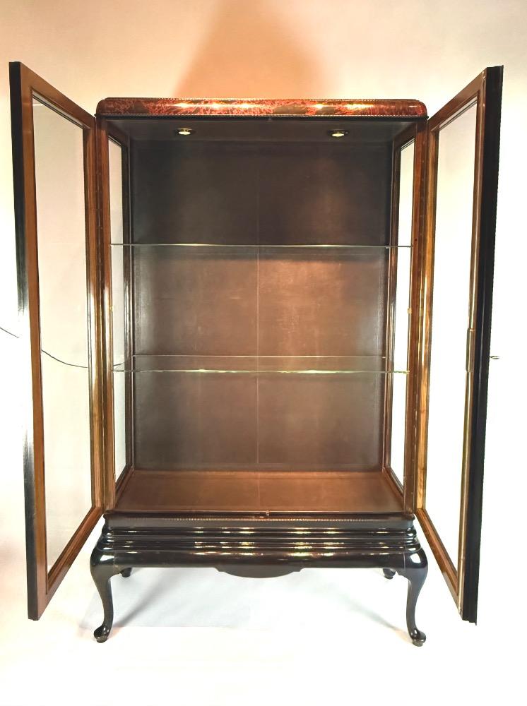 A tortoise shell Vitrine by Maison Franck