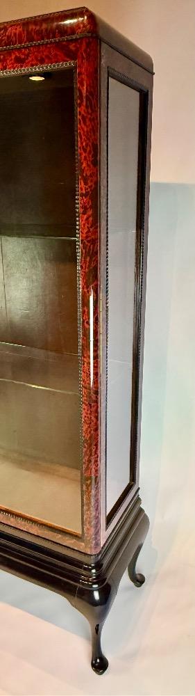 A tortoise shell Vitrine by Maison Franck