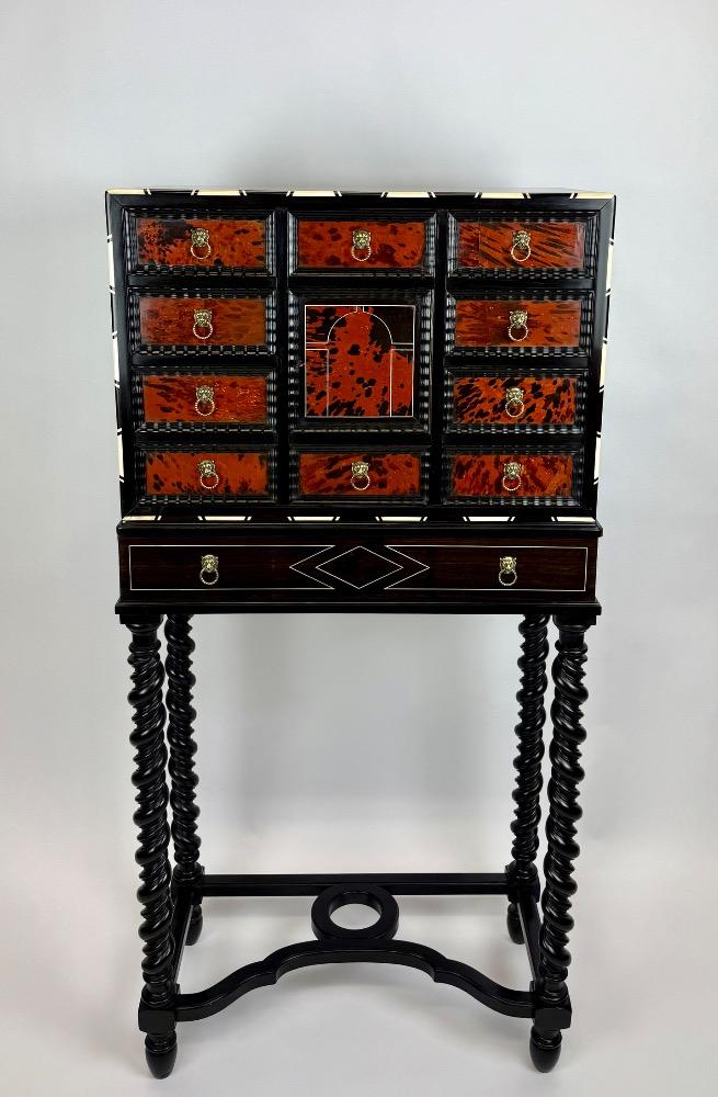  A tortoiseshell cabinet of curiosities
