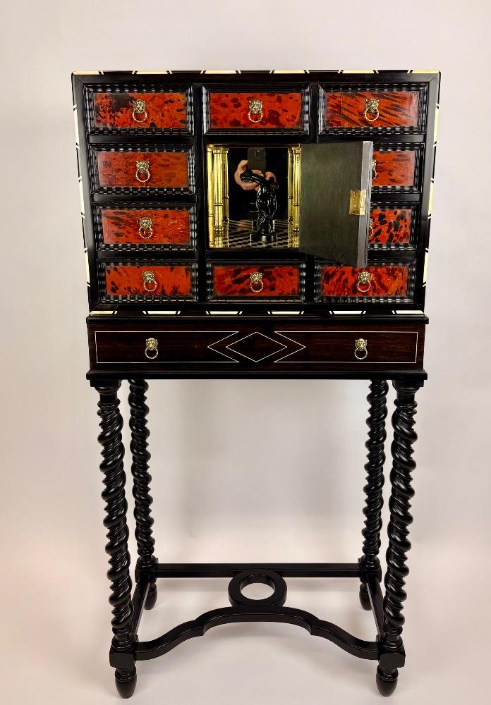  A tortoiseshell cabinet of curiosities