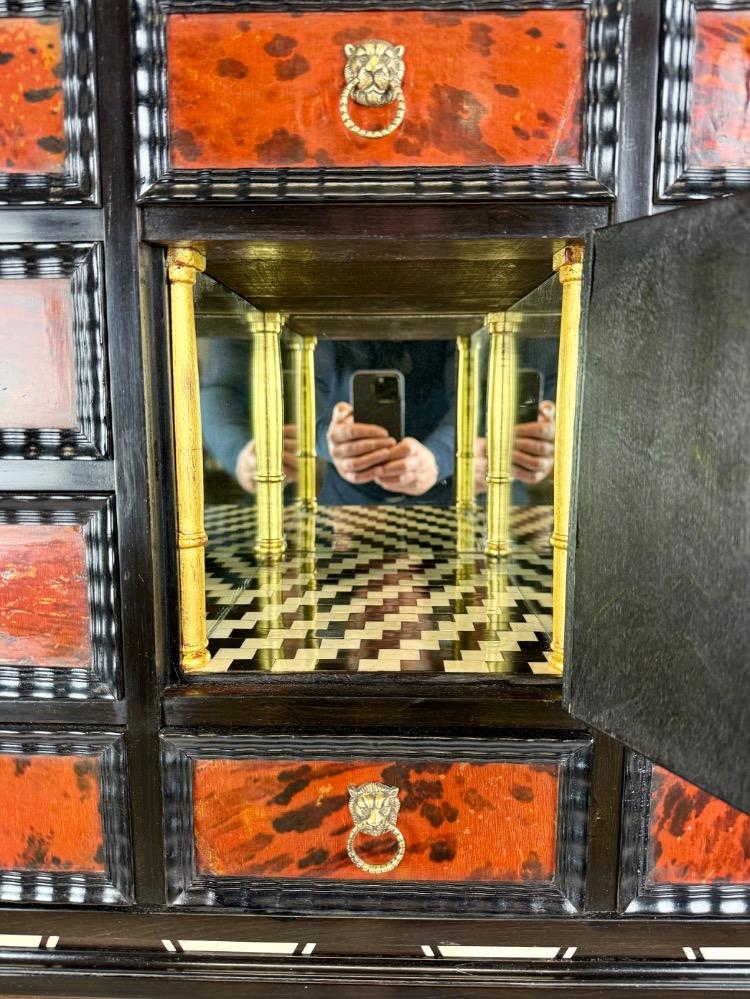  A tortoiseshell cabinet of curiosities