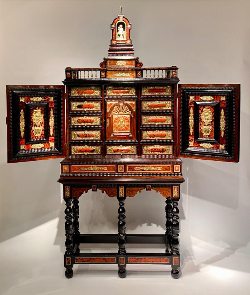 A very imposing Antwerp ormolu-mounted tortoiseshell cabinet on stand.