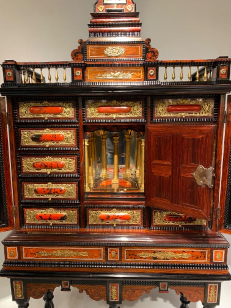 A very imposing Antwerp ormolu-mounted tortoiseshell cabinet on stand.