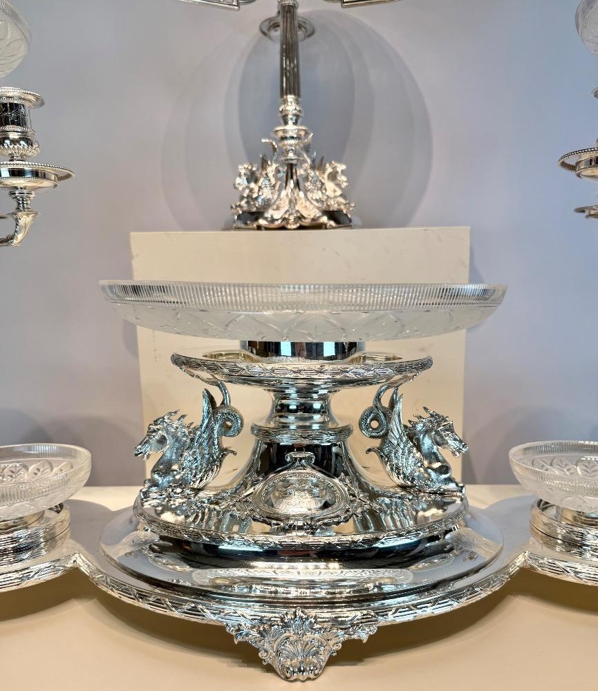 A Victorian 19thC silver plated bronze and crystal ten-piece table garniture by Mappin & Webb, London.
