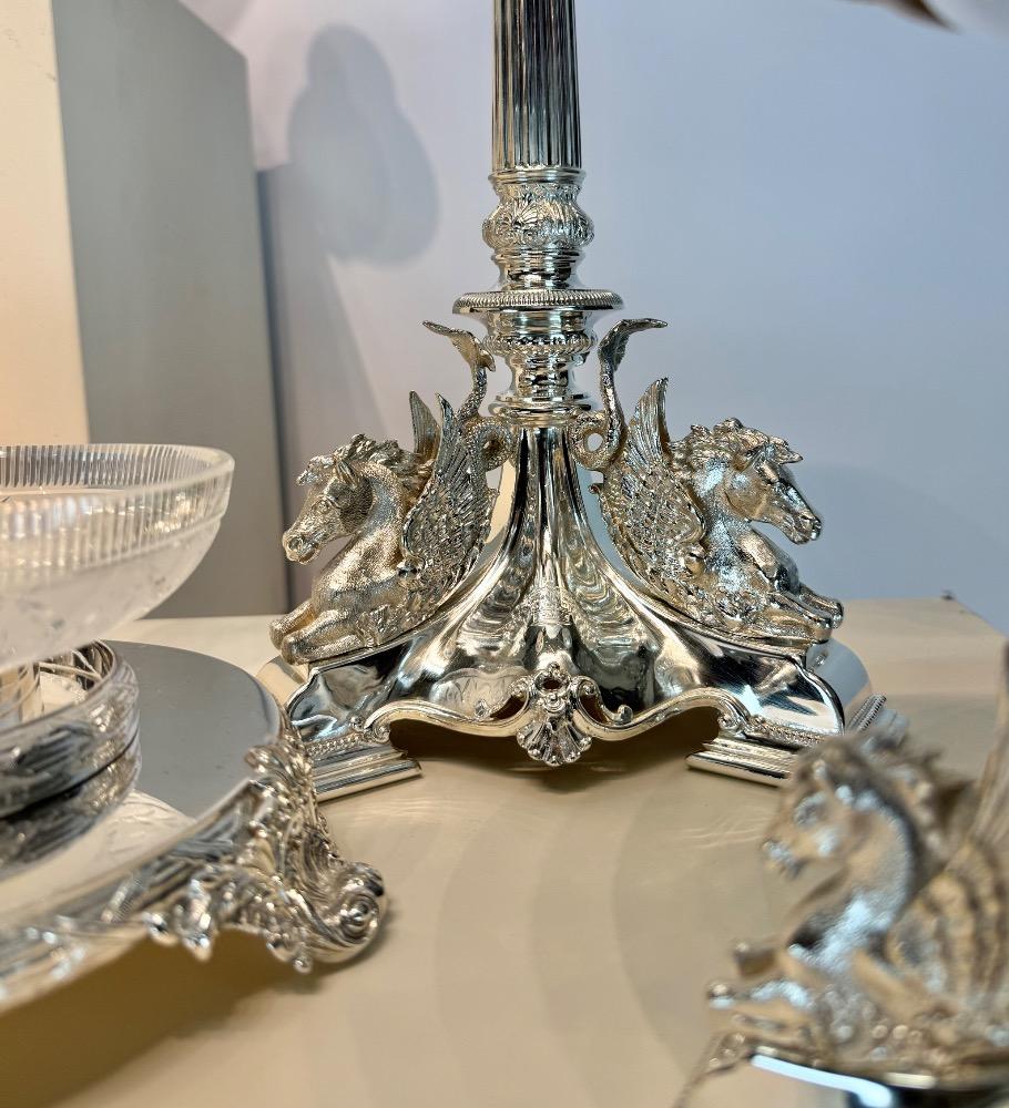 A Victorian 19thC silver plated bronze and crystal ten-piece table garniture by Mappin & Webb, London.