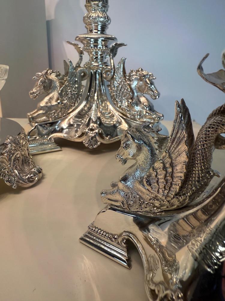 A Victorian 19thC silver plated bronze and crystal ten-piece table garniture by Mappin & Webb, London.