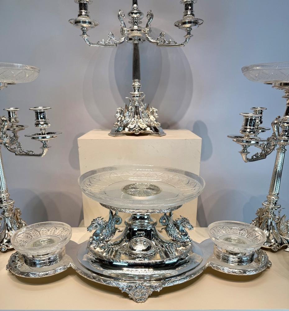 A Victorian 19thC silver plated bronze and crystal ten-piece table garniture by Mappin & Webb, London.