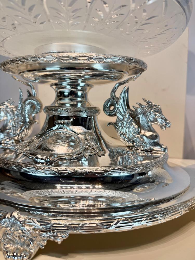 A Victorian 19thC silver plated bronze and crystal ten-piece table garniture by Mappin & Webb, London.