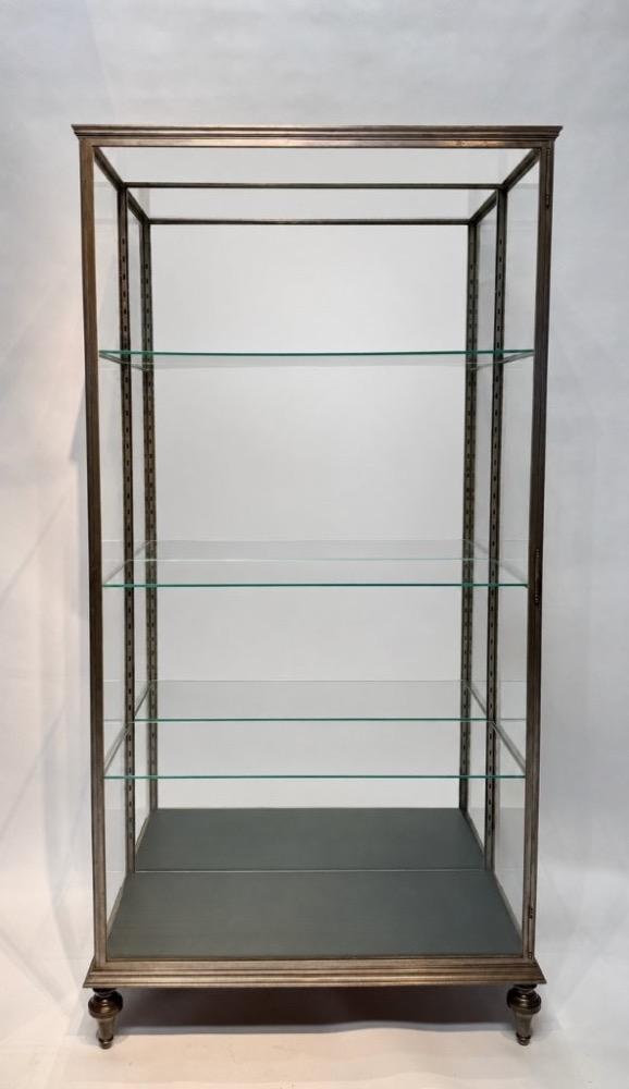 An early 20thC. iron display cabinet. 