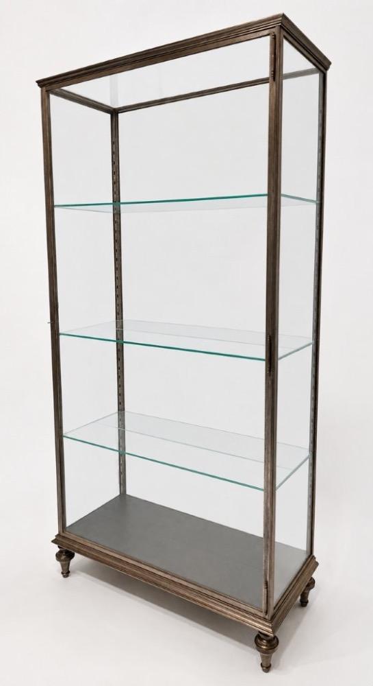 An early 20thC. iron display cabinet. 