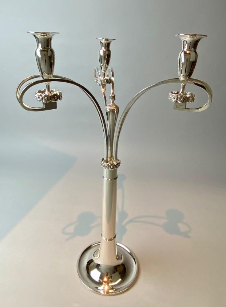An elegant pair of Austro-Hungarian solid silver Biedermeier style candelabra.